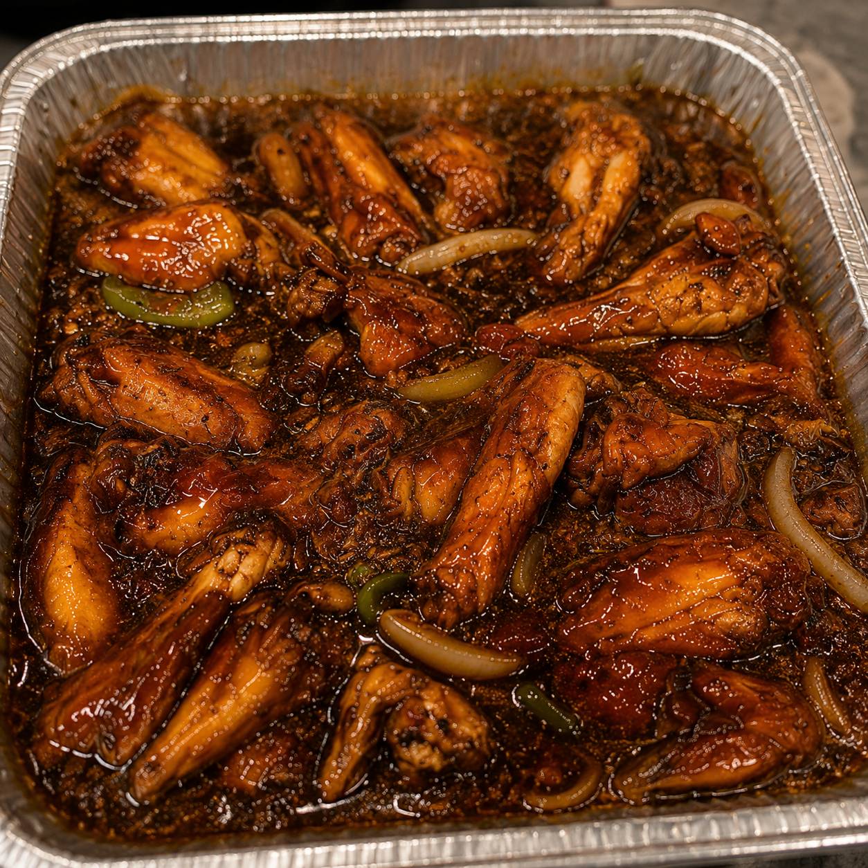 Glazed chicken with peppers and onions